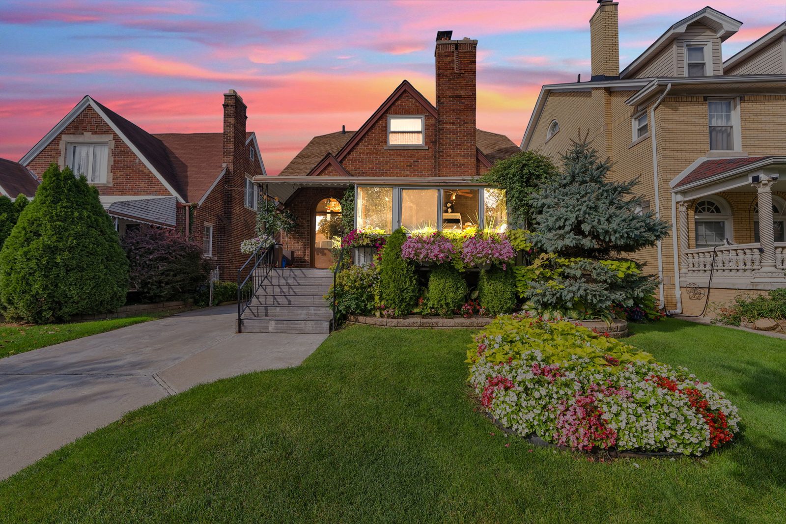7533 Hartwell St, a brick two-story home in Dearborn, at twilight